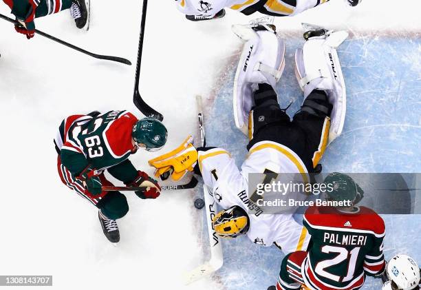 Casey DeSmith of the Pittsburgh Penguins makes the third period save on Jesper Bratt of the New Jersey Devils at the Prudential Center on March 20,...