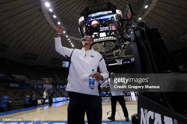 Head coach Juwan Howard of the Michigan Wolverines reacts following his team's victory against the Texas Southern Tigers in the first round game of...