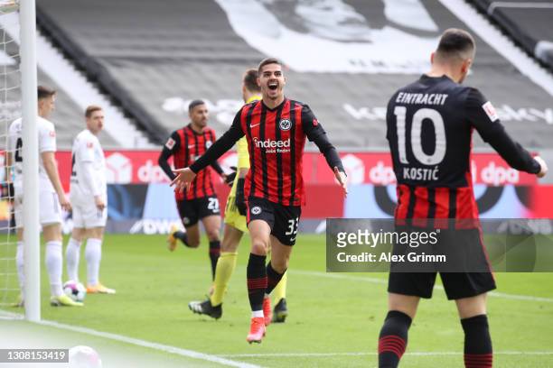 Andre Silva of Frankfurt celebrates his team's first goal with teammate Filip Kostic during the Bundesliga match between Eintracht Frankfurt and 1....