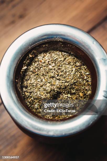 close-up of mate amargo, also known as yerba mate, preparation, without the straw,  traditional drink in uruguay - uruguay stock pictures, royalty-free photos & images