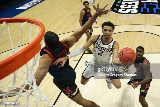 James Bouknight of the Connecticut Huskies shoots against the Maryland Terrapins during the first half in the first round game of the 2021 NCAA Men's...