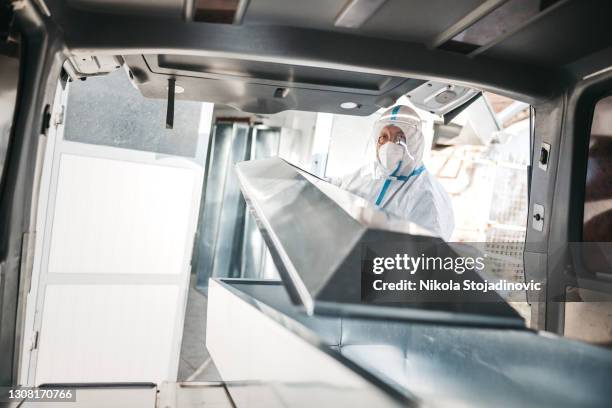 covid 19 dead patient - crematorium stock pictures, royalty-free photos & images