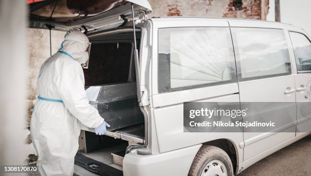 coffin for covid 19 - coronavirus curve stock pictures, royalty-free photos & images