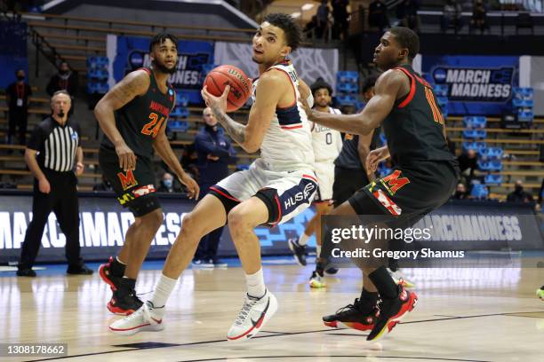 James Bouknight of the Connecticut Huskies looks to shoot against Darryl Morsell of the Maryland Terrapins during the second half in the first round...