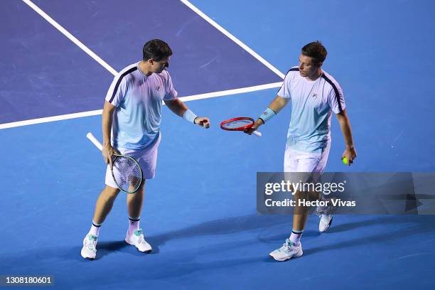 Ken Skupski and Neal Skupski of Great Britain celebrate during the Doubles final match between Marcel Granollers of Spain with Horacio Zeballos of...