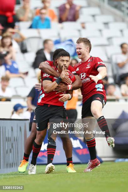 Richie Mo'unga of the Crusaders celebrates after scoring a try during the round four Super Rugby Aotearoa match between the Blues and the Crusaders...