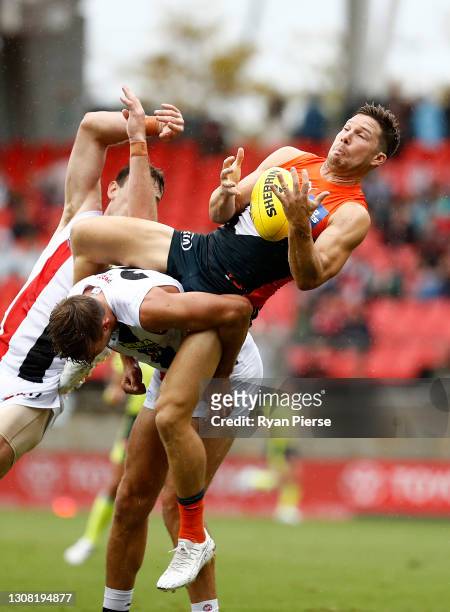 Toby Greene of the Giants takes a mark during the round one AFL match between the GWS Giants and the St Kilda Saints at GIANTS Stadium on March 21,...