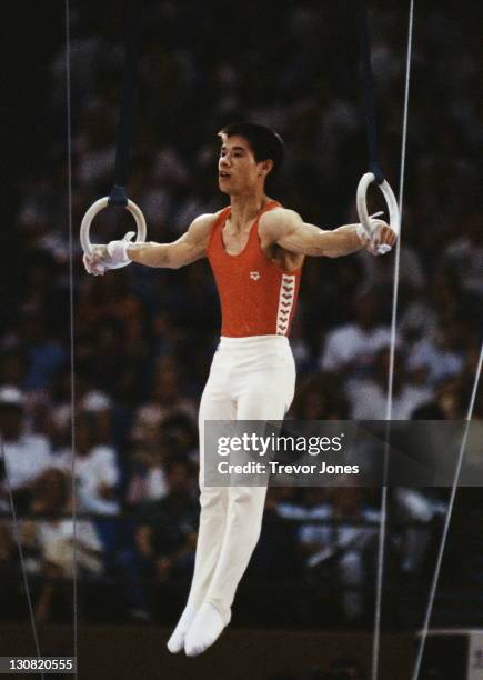 Li Ning of China performs the crucifix position during the Men's Gymnastics Rings event on 4th August 1984 during the XXIII Olympic Summer Games at...