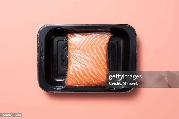vacuum packed atlantic salmon belly - salmon steak stock pictures, royalty-free photos & images