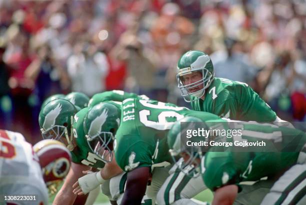 Quarterback Ron Jaworski of the Philadelphia Eagles stands behind the center at the line of scrimmage during a game against the Washington Redskins...