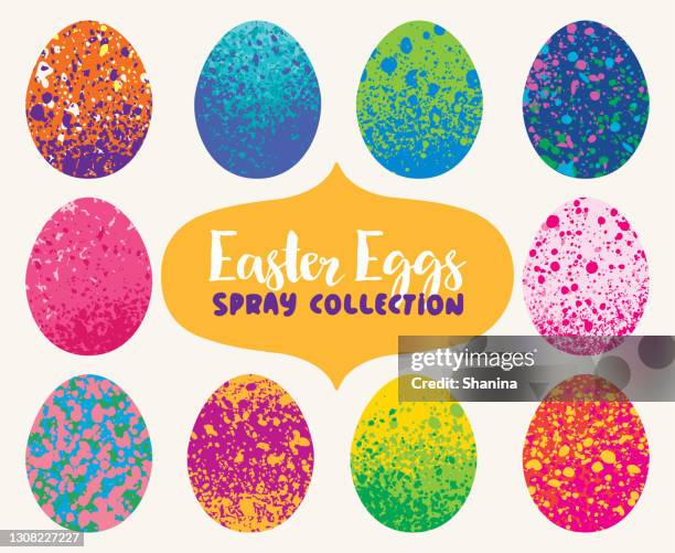 set of spray splattered paint easter eggs - easter crafts stock illustrations