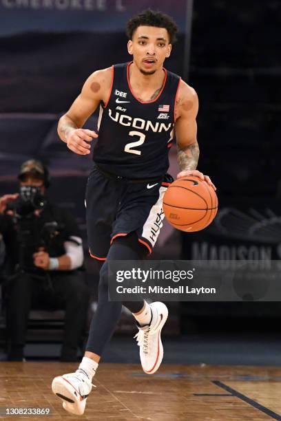 James Bouknight of the Connecticut Huskies dribbles up court during the Big East Men's Basketball Tournament - Semifinals college basketball game...