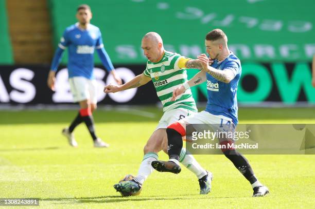 Celtic player Scott Brown is challenged by Rangers player Ryan Kent during the Ladbrokes Scottish Premiership match between Celtic and Rangers at...