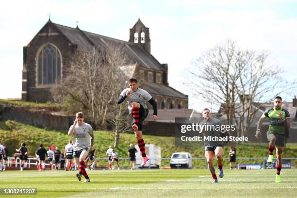 Gavin Henson of West Wales Raiders warms up alongside team mate Rangi Chase ahead of the Betfred Challenge Cup match between West Wales Raiders and...