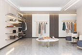 Luxury Clothing Store With Clothes, Shoes And Other Personal Accessories.