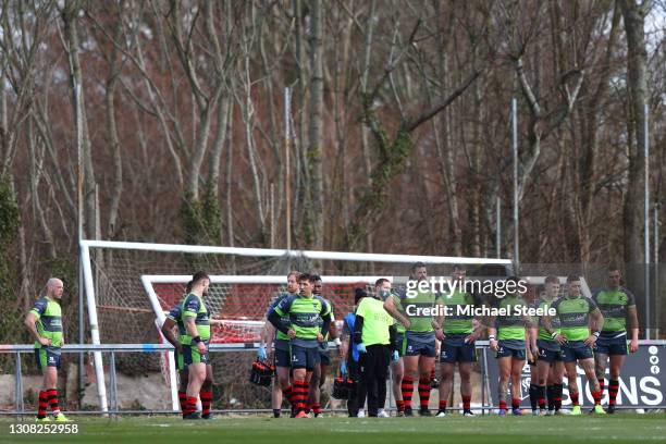 Players of West Wales Raiders led by Gavin Henson and Rangi Chase look on during the Betfred Challenge Cup match between West Wales Raiders and...