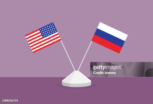 stockillustraties, clipart, cartoons en iconen met de vlag van de v.s. en van rusland op een lijst - russian flag