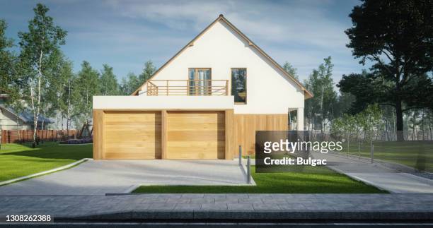 modern suburbian family house - modern garage stock pictures, royalty-free photos & images