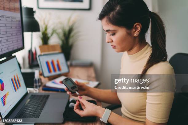 covid-19 working from home - diabetes technology stock pictures, royalty-free photos & images