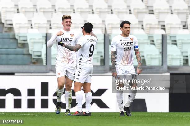 Adolfo Gaich of Benevento Calcio celebrtes after scoring their sides first goal with team mate Gianluca Lapadula during the Serie A match between...