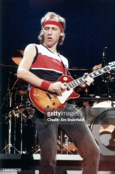 Rock band Dire Straits performs at the Roy Wilkins Auditorium in St. Paul, Minnesota on August 1, 1985.