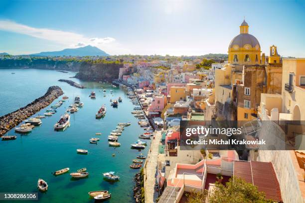 colorful corricella village on procida island (campania, italy) - piedmont italy stock pictures, royalty-free photos & images