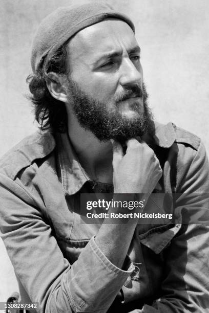 An officer from the Fuerzas Populares de Liberación, FPL, listens to a question from a western journalist during a press conference in La Palma, El...