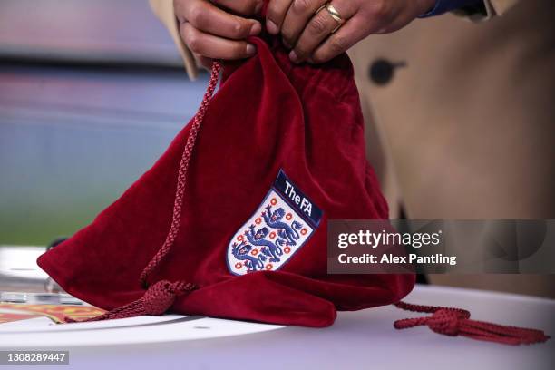 Dion Dublin, BBC Sport TV Presenter performs the FA Cup Semi Final draw which is made at half time from inside the stadium during the Emirates FA Cup...