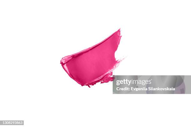 red smear of creamy eye shadow isolated on white. - white colour swatches stock pictures, royalty-free photos & images