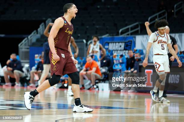 Lucas Williamson of the Loyola Chicago Ramblers celebrates a play against the Illinois Fighting Illini during the second half in the second round...