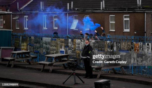 Featherstone Rovers fans watch play from behind the terrace fence during the Betfred Challenge Cup first round match between Featherstone Rovers and...