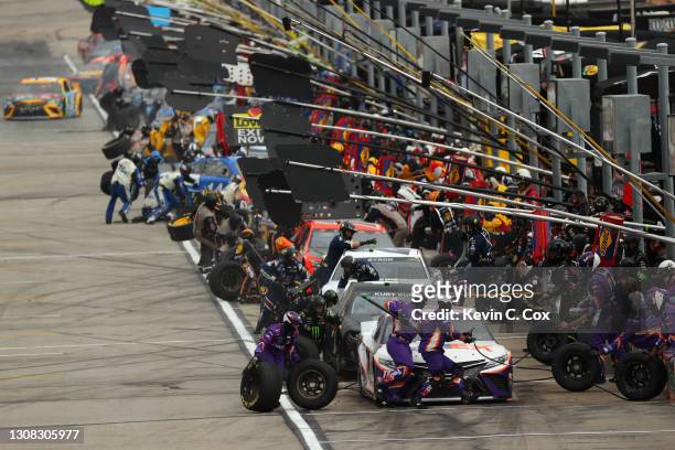 Denny Hamlin, driver of the FedEx Express Toyota, pits during the NASCAR Cup Series Folds of Honor QuikTrip 500 at Atlanta Motor Speedway on March...