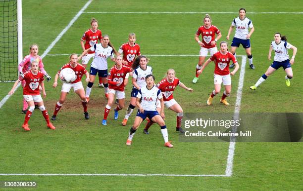 Players from both teams compete for the ball from a corner during the Barclays FA Women's Super League match between Tottenham Hotspur Women and...