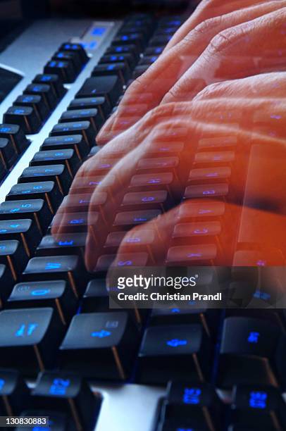 hands writing on a keyboard - mouses computer stock pictures, royalty-free photos & images