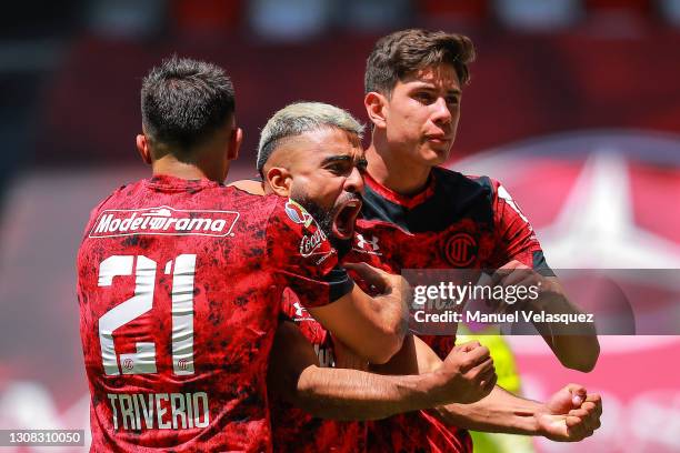 Pedro Canelo of Toluca celebrates the second scored goal of Toluca with his teammates during the 12th round match between Toluca and Puebla as part...