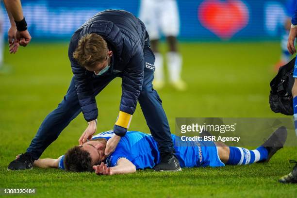 Dino Arslanagic of KAA Gent injured during the Jupiler Pro League match between KAA Gent and Cercle Brugge at Ghelamco Arena on March 21, 2021 in...