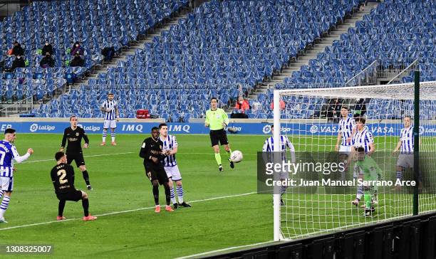 Sergino Dest of FC Barcelona scoring their side's third goal during the La Liga Santander match between Real Sociedad and FC Barcelona at Estadio...