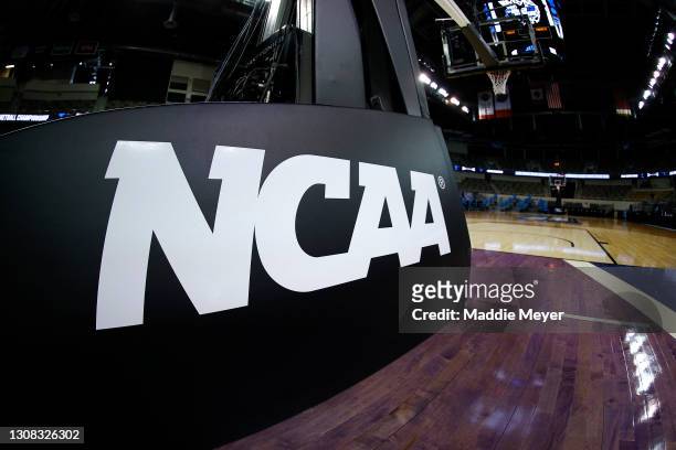 The NCAA logo is seen on the basket stanchion before the game between the Oral Roberts Golden Eagles and the Florida Gators in the second round game...