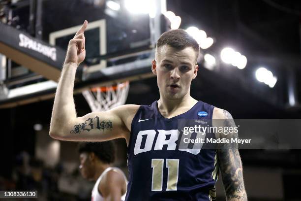 Carlos Jurgens of the Oral Roberts Golden Eagles reacts in the first half against the Florida Gators in the second round game of the 2021 NCAA Men's...