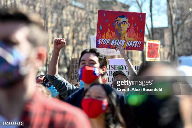 People gather to protest at the "Rally Against Hate" in Chinatown on March 21, 2021 in New York City. Stop Asian Hate rallies have been happening in...