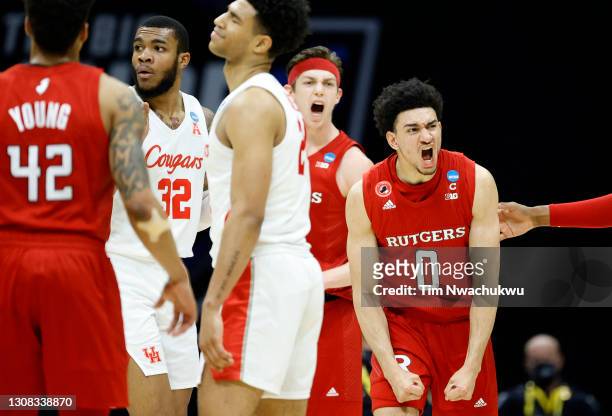 Geo Baker of the Rutgers Scarlet Knights reacts during the second half against the Houston Cougars in the second round game of the 2021 NCAA Men's...