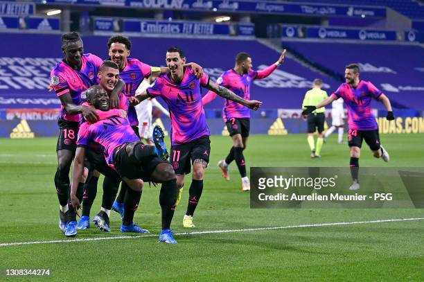 Danilo of Paris Saint-Germain is congratulated by teammates Moise Kean, Marco Verratti, Marquinhos and Angel Di Maria after scoring during the Ligue...