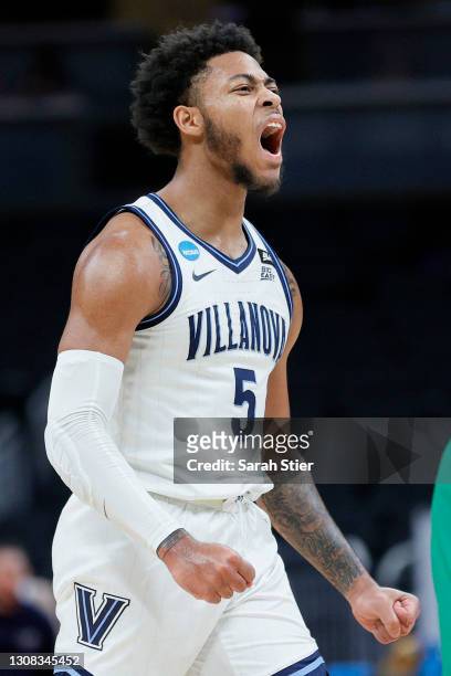 Justin Moore of the Villanova Wildcats reacts to a play against the North Texas Mean Green in the first half of their second round game of the 2021...