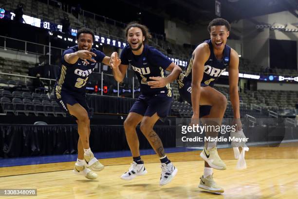 Sheldon Stevens, Kareem Thompson and Jamie Bergens of the Oral Roberts Golden Eagles celebrate after defeating the Florida Gators in the second round...