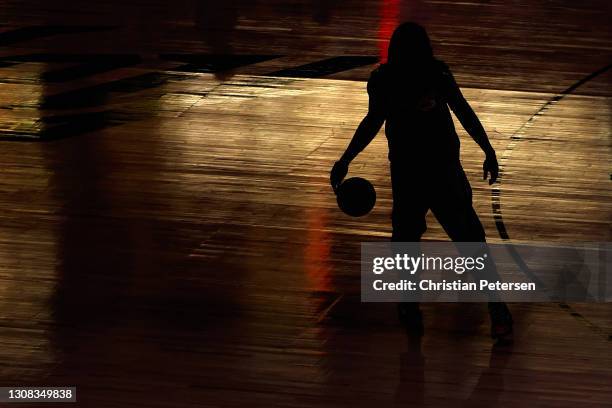 Montrezl Harrell of the Los Angeles Lakers warms up before the NBA game against the Phoenix Suns at Phoenix Suns Arena on March 21, 2021 in Phoenix,...