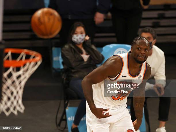 Julius Randle of the New York Knicks watches his last second shot pop out of the net givving the Philadelphia 76ers the win at Madison Square Garden...