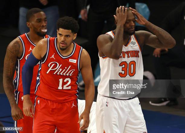 Julius Randle of the New York Knicks reacts after he is called for fouling Tobias Harris of the Philadelphia 76ers in the final seconds of overtime...