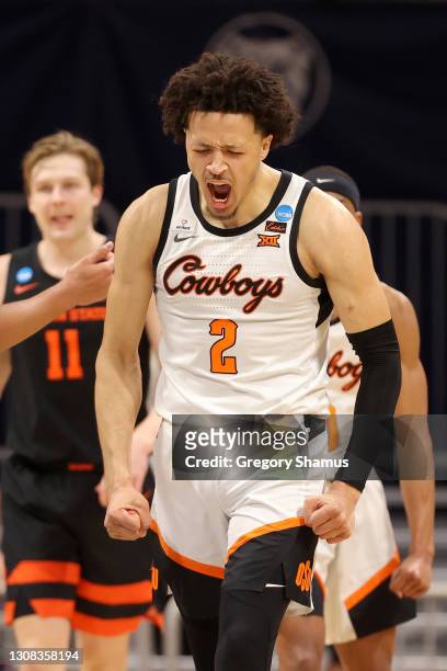Cade Cunningham of the Oklahoma State Cowboys reacts against the Oregon State Beavers during the second half in the second round game of the 2021...