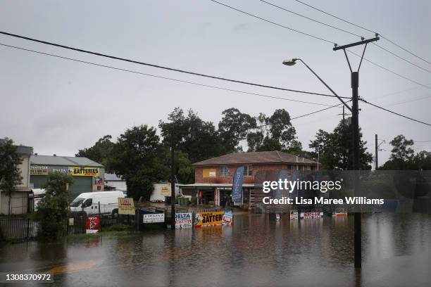 Businesses in South Windsor are affected by rising floodwaters from the Hawkesbury River on March 22, 2021 in Sydney, Australia. Evacuation warnings...