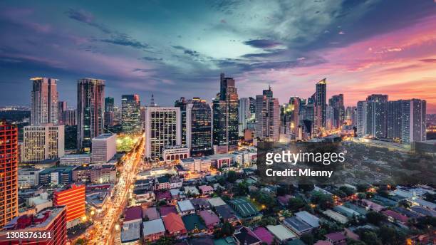 manila makati cityscape at sunset panorama philippines - romantic sky stock pictures, royalty-free photos & images